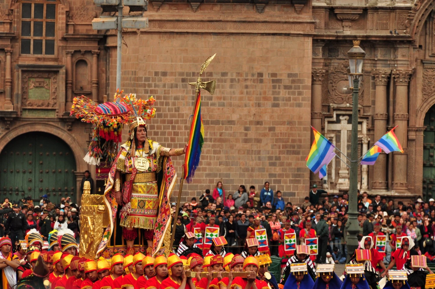 Inti Raymi celebration in Sacsayhuamán with dancers and crowds